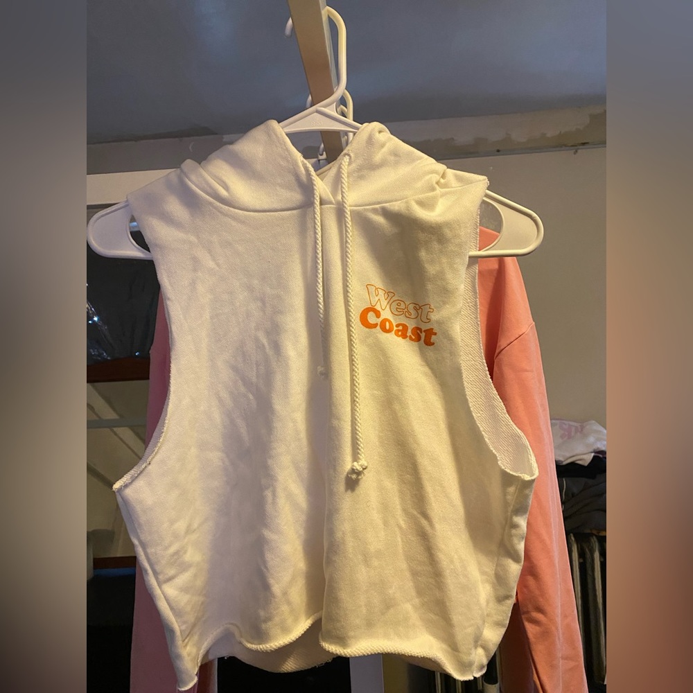 White & orange. Size S. Never worn.